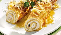 Pictured here with savory filling, Palatschinknen can also be stuffed with sweet filling.